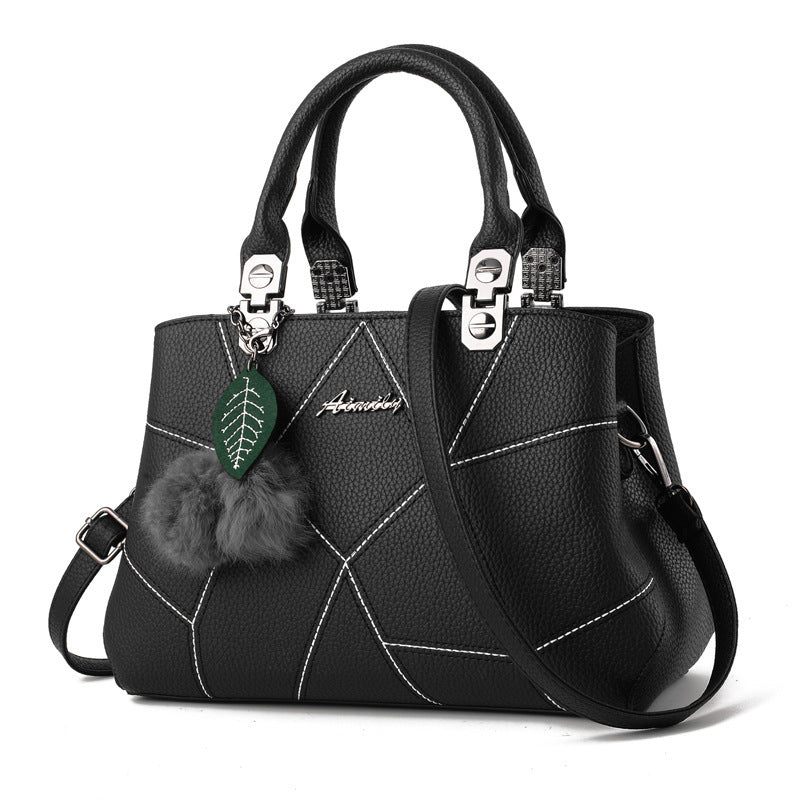 Geometric Print Bag with Ball Pendant