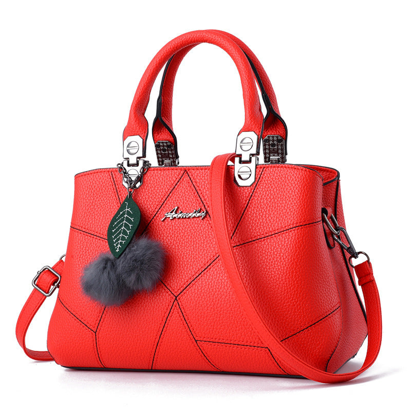Geometric Print Bag with Ball Pendant