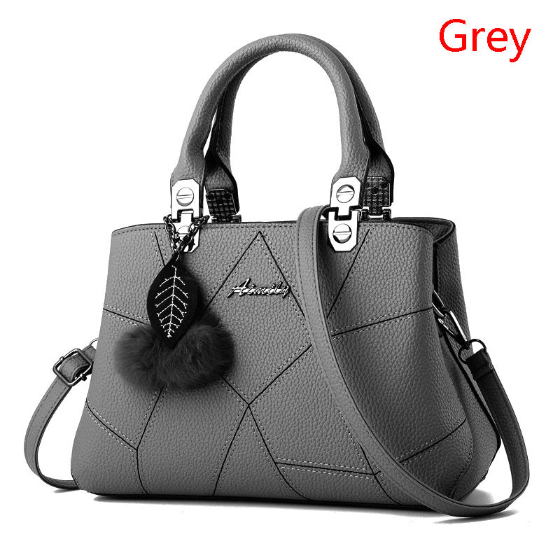 Geometric Print Bag with Ball Pendant